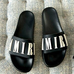 Amiri slides gently used !